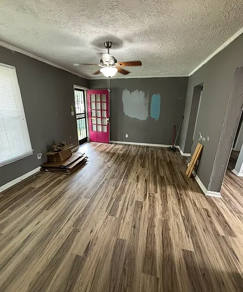 Living room from other side, walls and door being repainted soon.