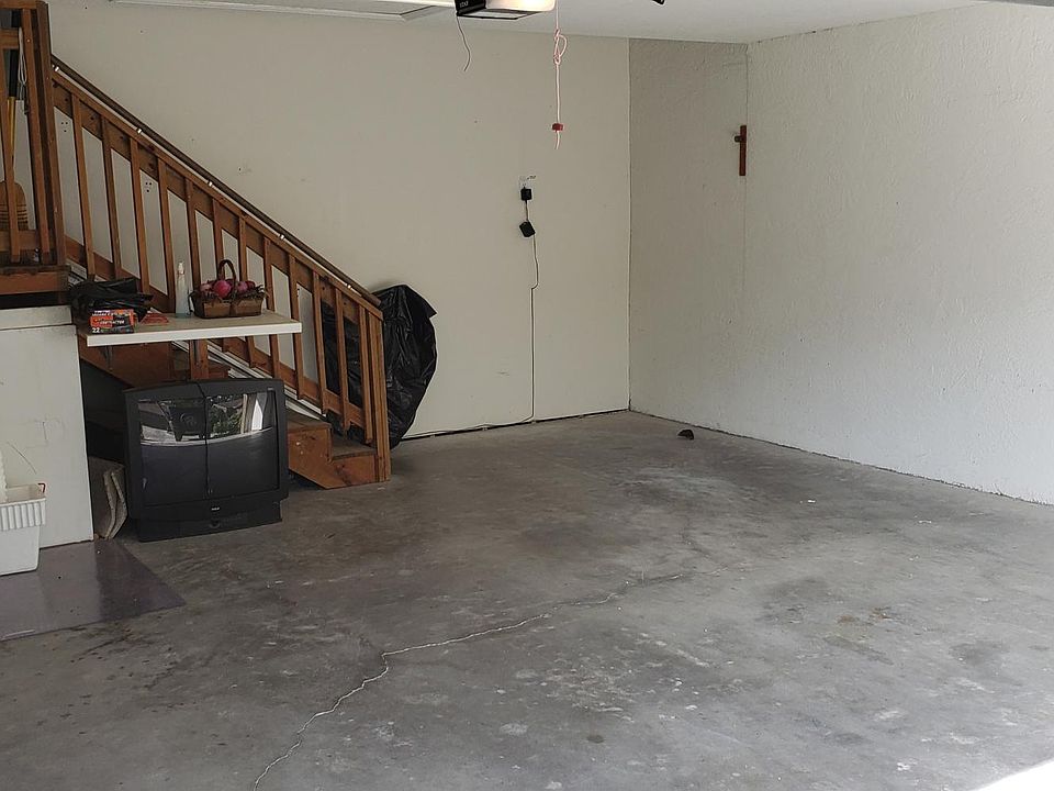 2 car garage with chair lift.