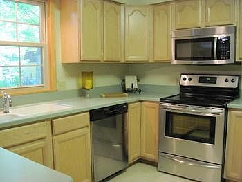 Want a bright and cheery kitchen with newer appliances Corian counter tops and Maple cabinets?  Then this kitchen is the kitchen for you.  