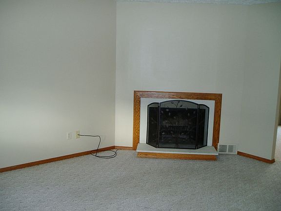 Living Room with Bay Window and Fireplace