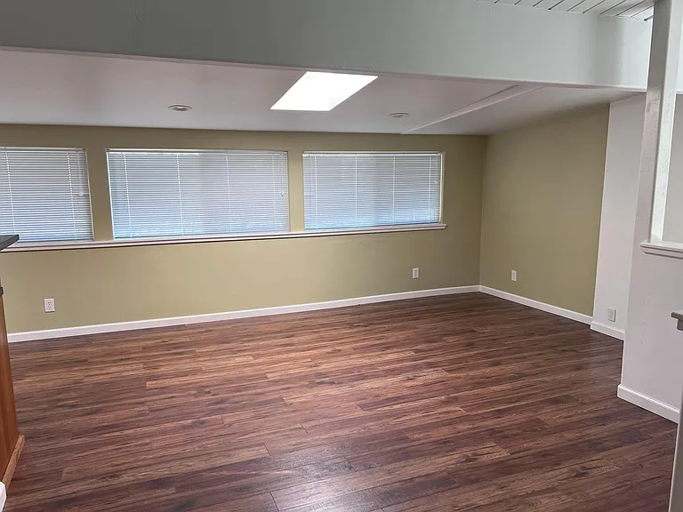 Looking from formal dining/office area to "informal dining" area (kitchen is to the left.