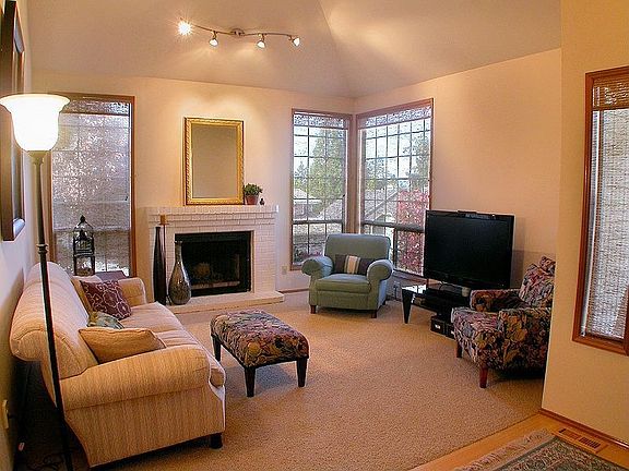 Bamboo flooring & new carpet greet you in frml living room.