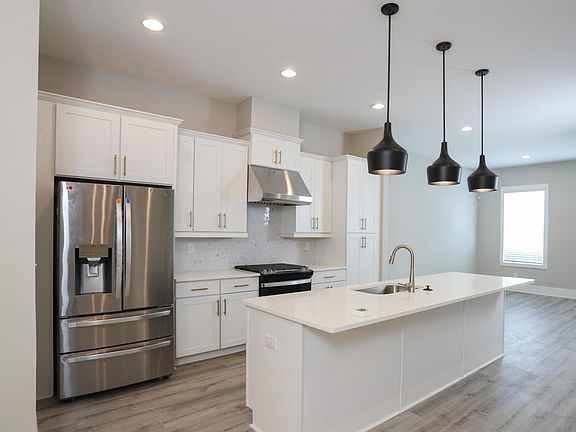 Kitchen with brand new French door refrigerator with Ice Maker