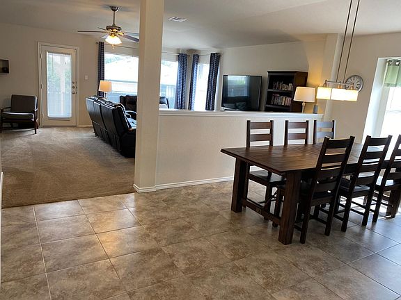 Large dining area attached to kitchen; great light from large window
