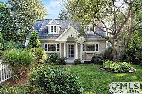 Front of the house with lovely perennial gardens