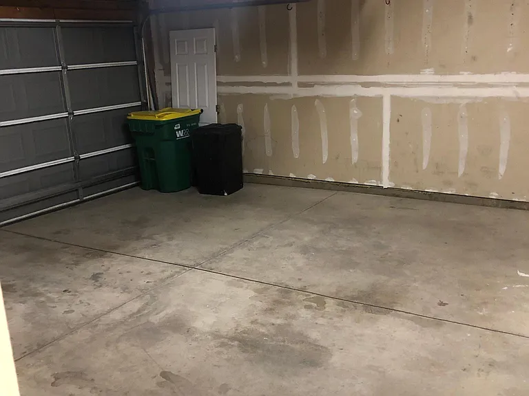 2-car garage with overhead storage space