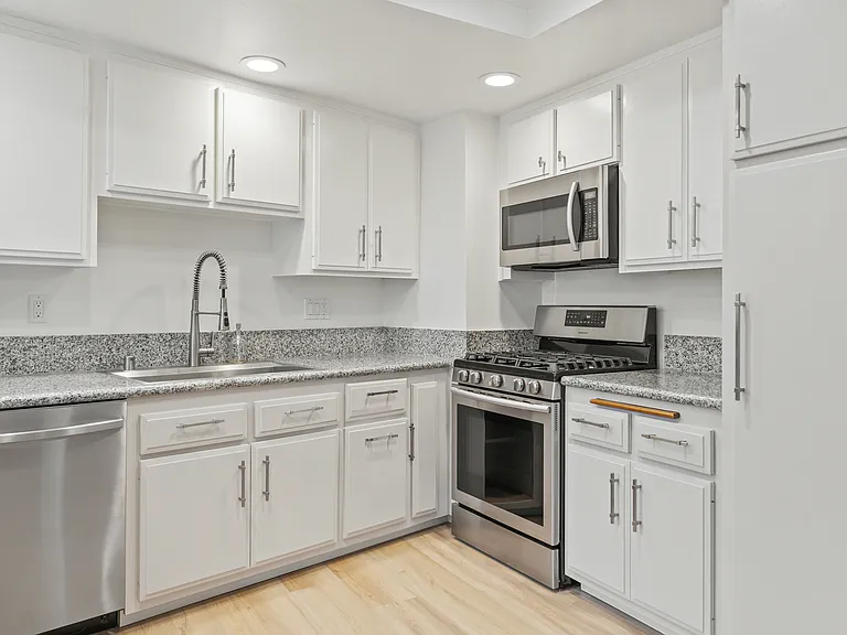 Upgraded and immaculate describe this kitchen