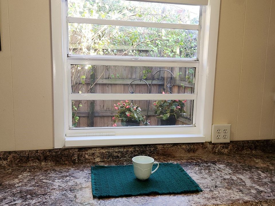 Enjoy morning coffee looking over the courtyard.
