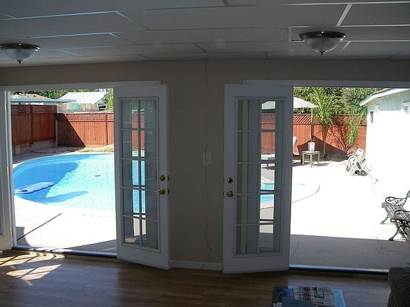 Enclosed Patio Overlooks Pool