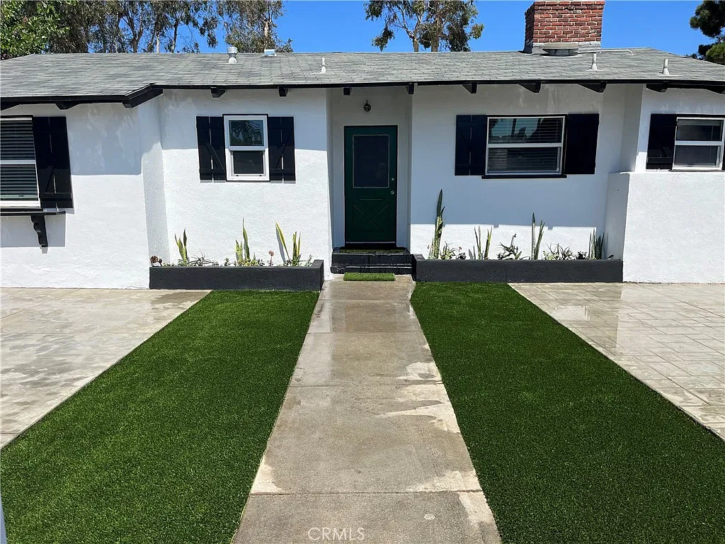 5061 Warner Ave — Photo 1
