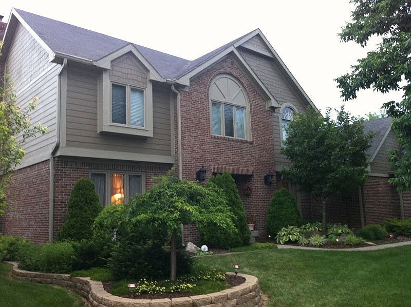 Curb appeal with brick, hardy and shaker shingles