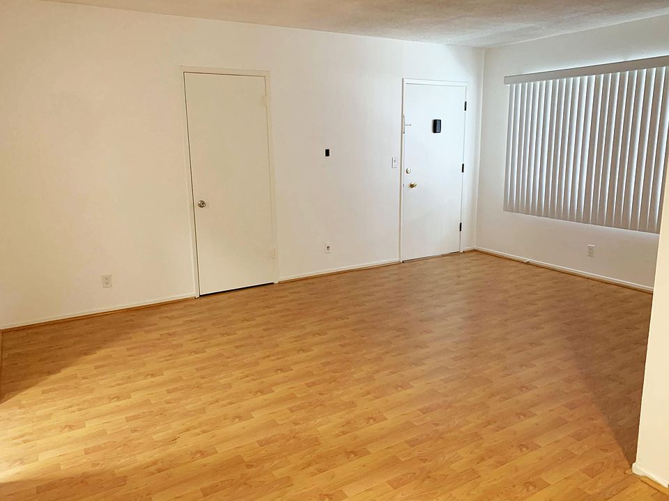 front door and walk-in closet off living room.