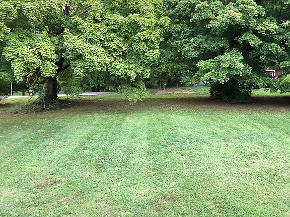 Front yard facing Cedar Lane.