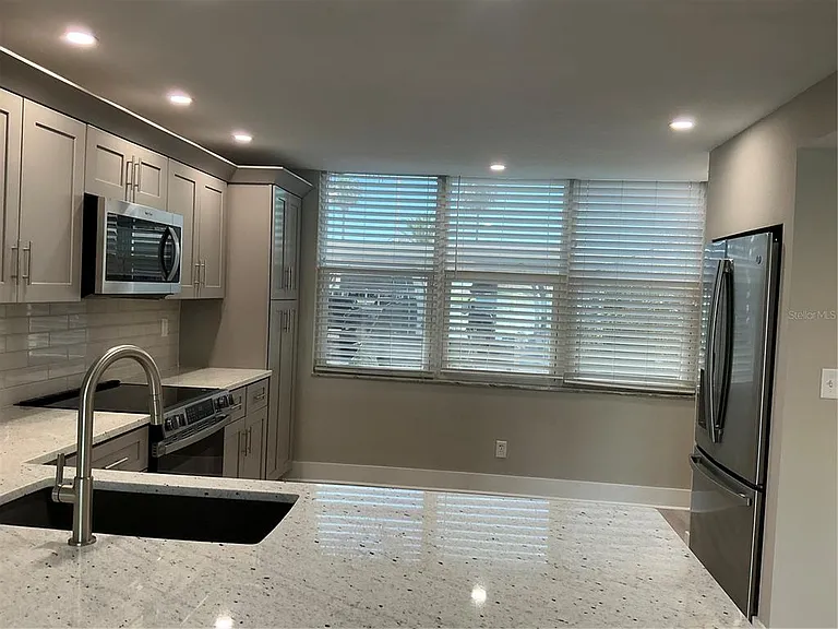 7645 Sun Island Dr S #101 — Photo 15
