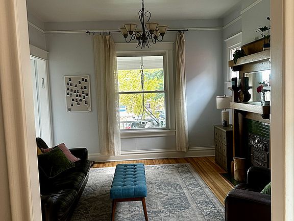 Cozy living room with original fireplace