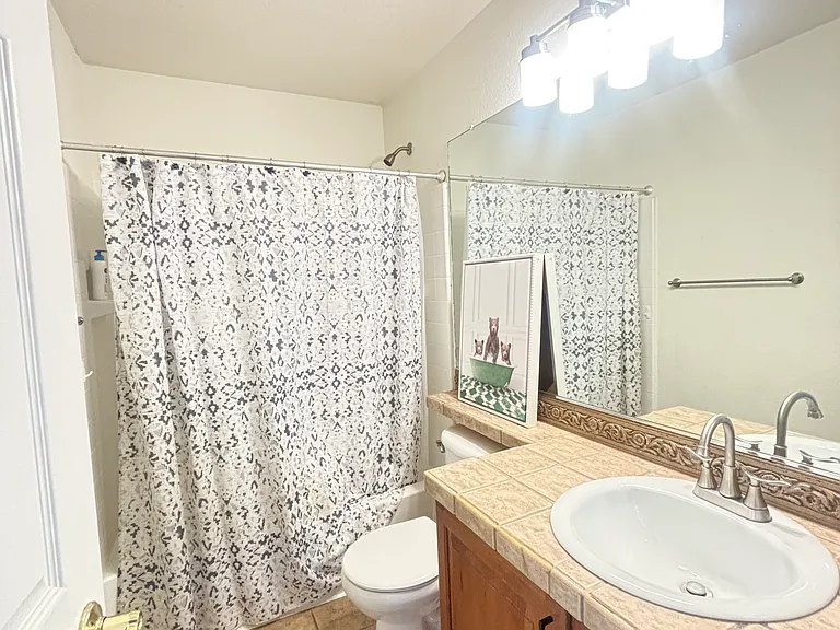 7425 S Norfolk St — Photo 13