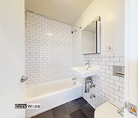 5th image of 407 W 50th St APT 15
