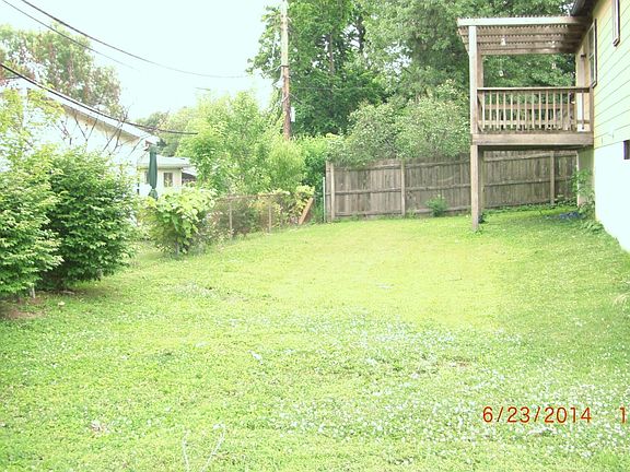 back Lawn of 11853 Smokerise backed up to Neighbors Fence ov