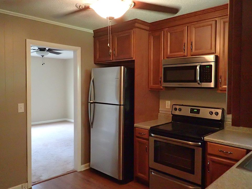 Remodeled Kitchen with Custom Wood Cabinetry and Stainless Appliances
