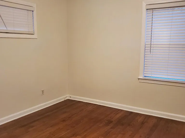 Bedroom - orginal wood floors throughout