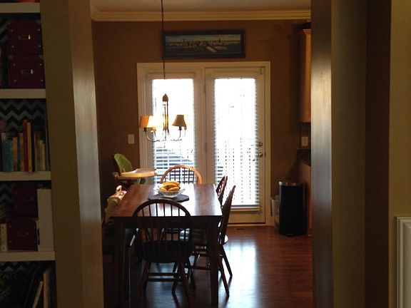 View from the living room into the dining/kitchen area