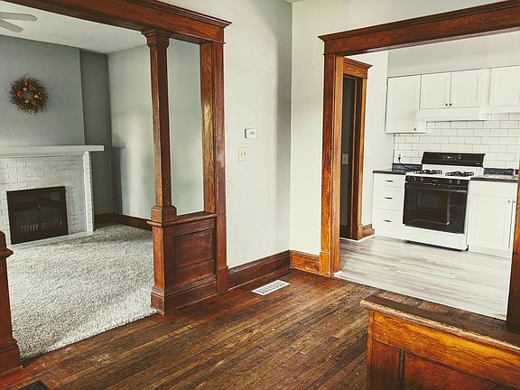 Entry way view of living room and kitchen