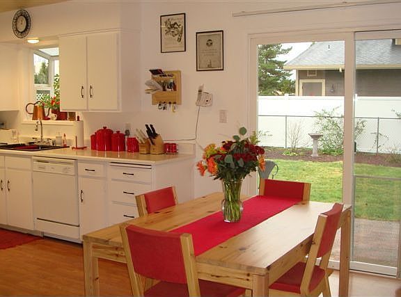 Dining room with slider to backyard patio