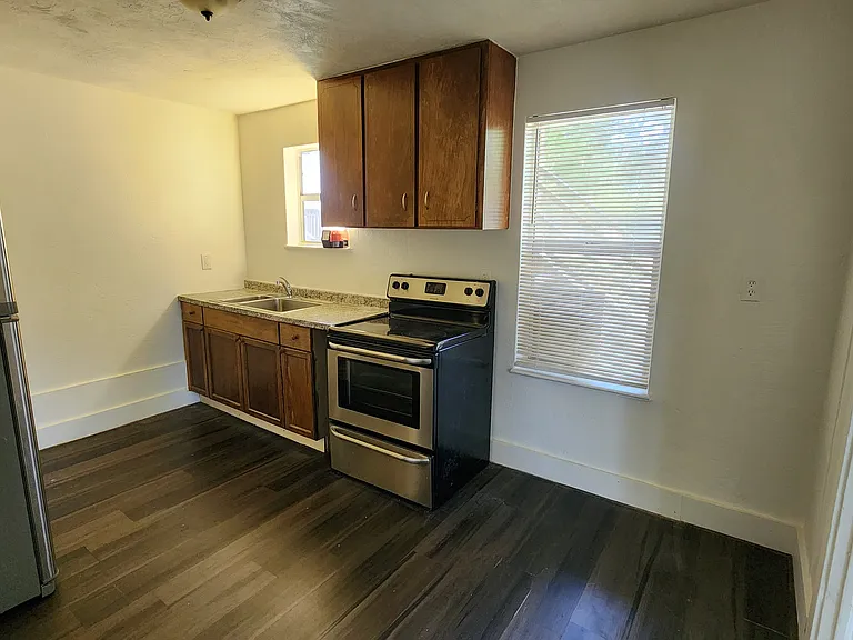 The kitchen has space for a dining table.