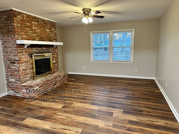 Use the cozy space off the kitchen as dining room or den