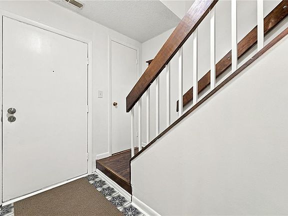 2nd image of 301 Village Ln Unit F