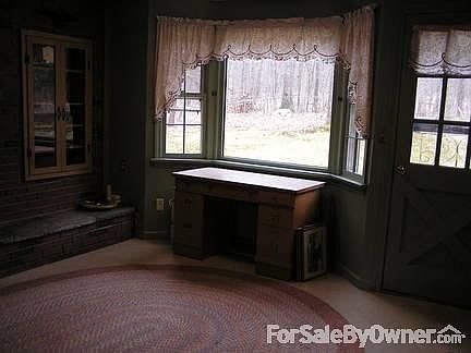 BAY WINDOW IN DINING AREA AND BACK ENTRY
