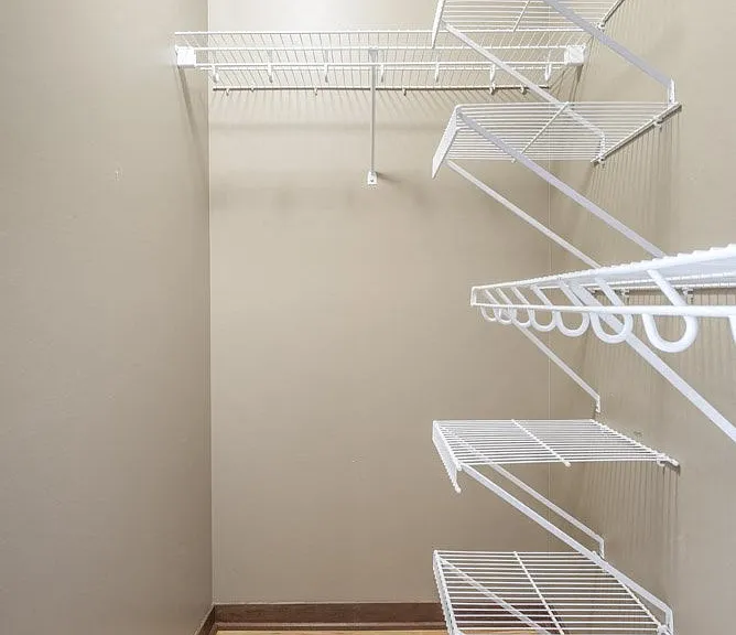 Enjoy the convenience of a walk-in closet with ample shelving and hanging space.