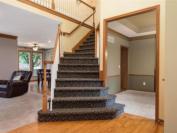 2 Story Entry with Upgraded Stair Carpet.