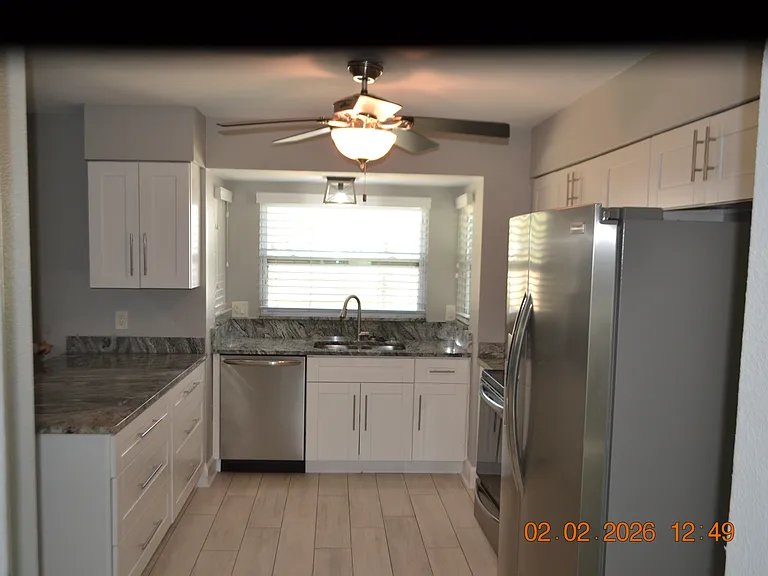 6204 W Knights Griffin Rd — Photo 3
