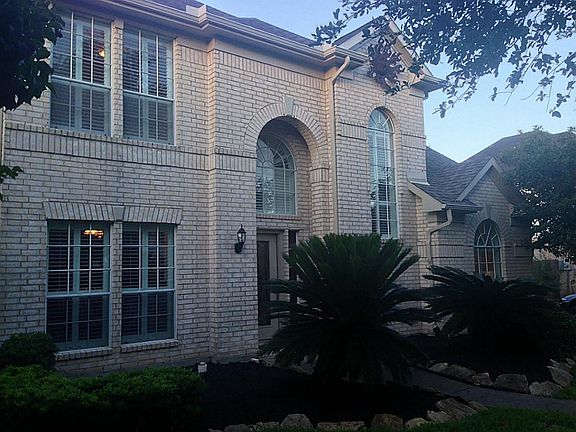 Well kept exterior and fresh landscaping.