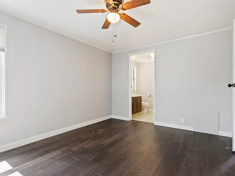 primary bedroom + attached bathroom