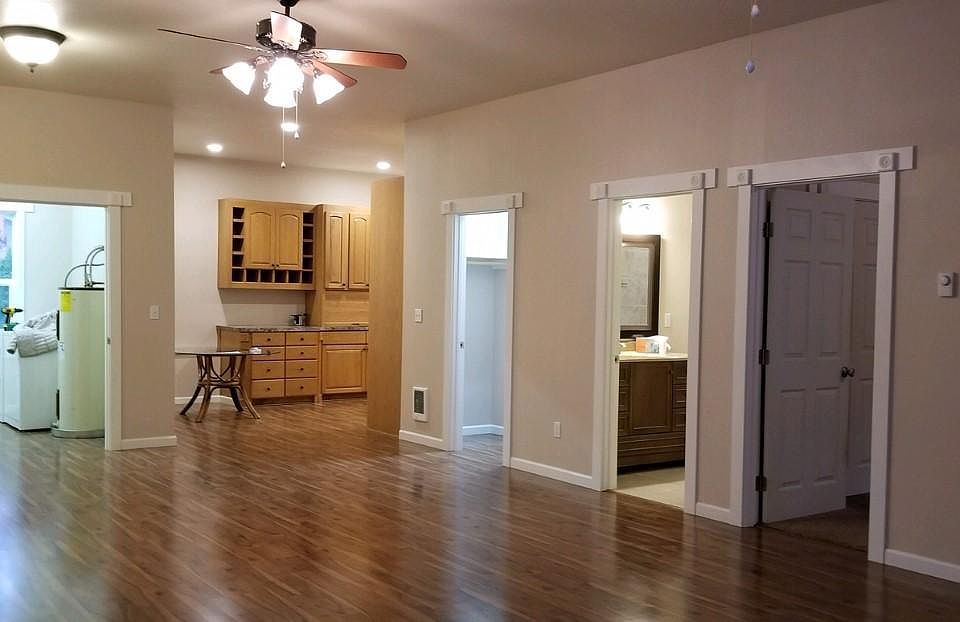 From entrance door facing Laundry room, Kitchen, walk in closet, bath room and bedroom.