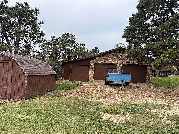 Detached garage & shed