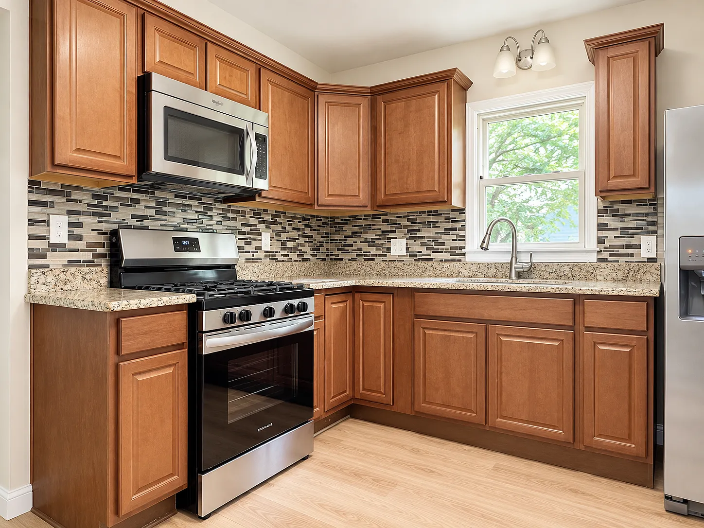Renovated 3-Bedroom Livonia Home with Fenced Yard & Garage — Photo 4
