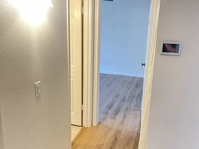 Hallway to Guest Bath and Guest Room