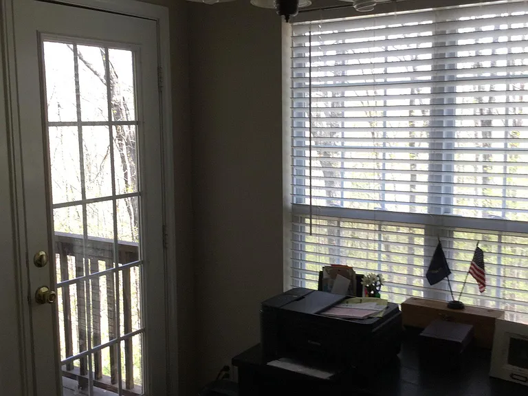 Room adjacent to kitchen and back deck.