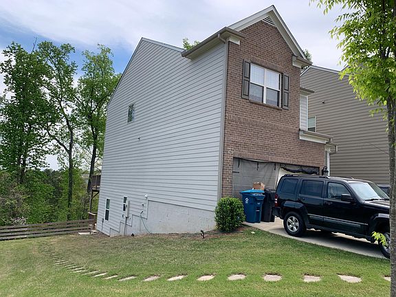 Walkway to basement walkout entrance.