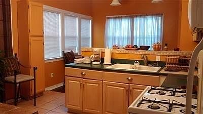 Kitchen open to Den