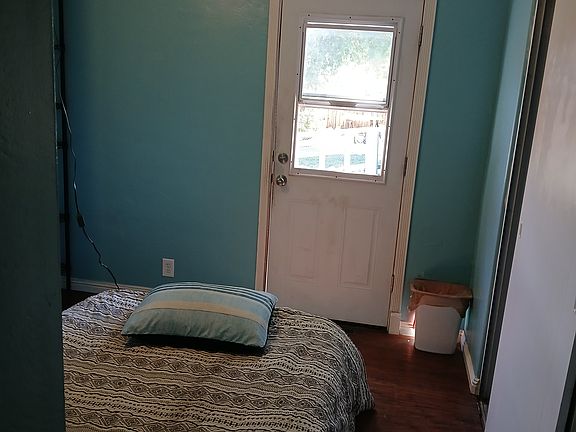 Door opens to backyard