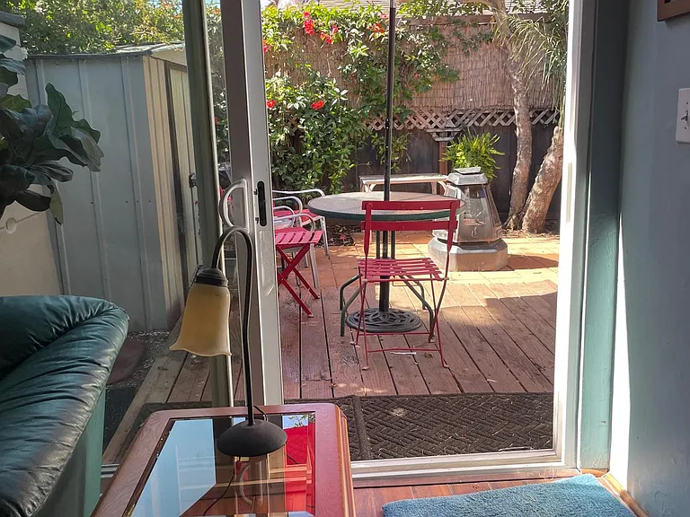 Deck, brick patio with firepit.