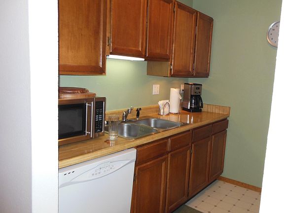 kitchen has new stainless dishwasher not shown