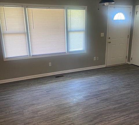 Fresh paint and new laminate flooring throughout the home