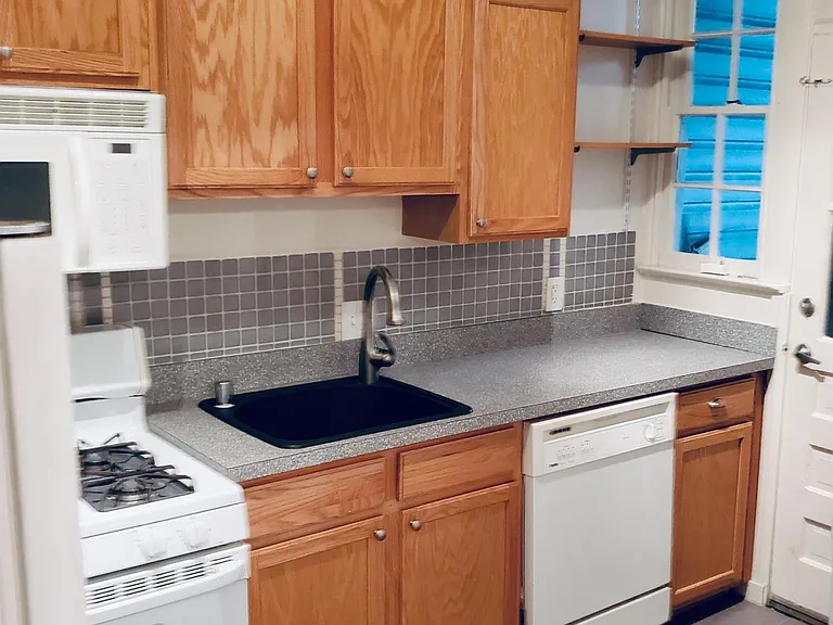 Kitchen.
Gas range, microwave oven, vent fan dishwasher, refrigerator/freezer, water filter