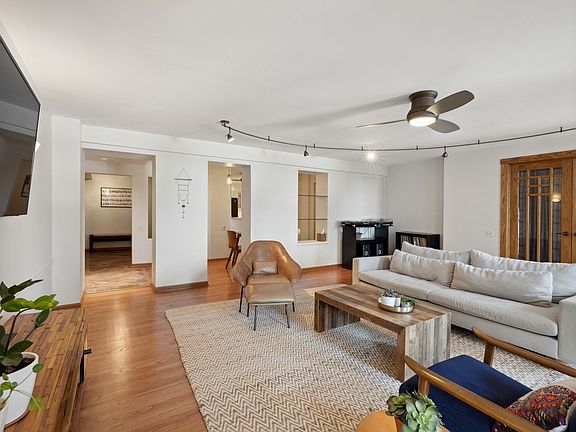 Living Room with Hardwood Floors & Original Wood D