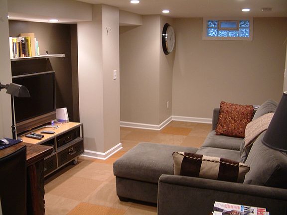 Finished basement with plenty of storage  and large half  bathroom